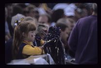 Young girl dressed as a cheerleader